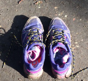 Photograph of my muddy trail shoes